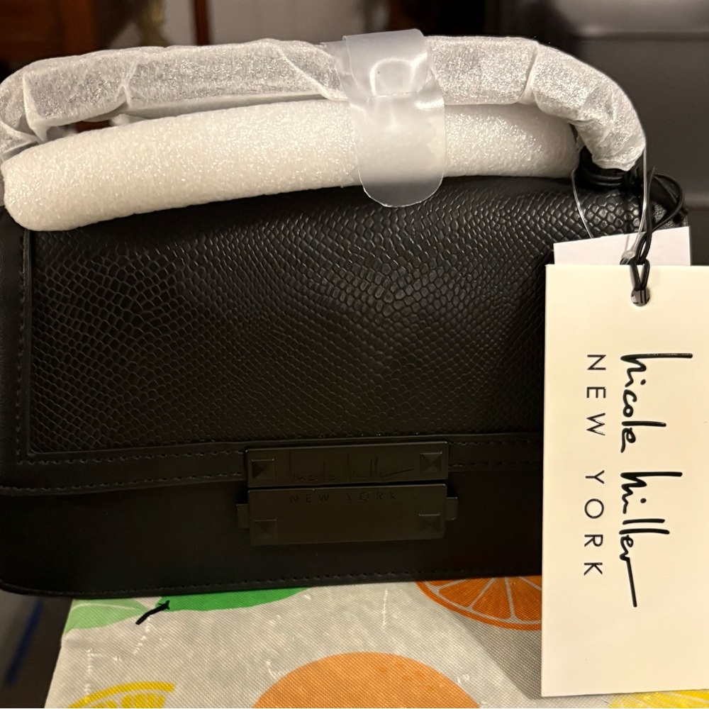 Nicole Miller Black Embossed Clutch